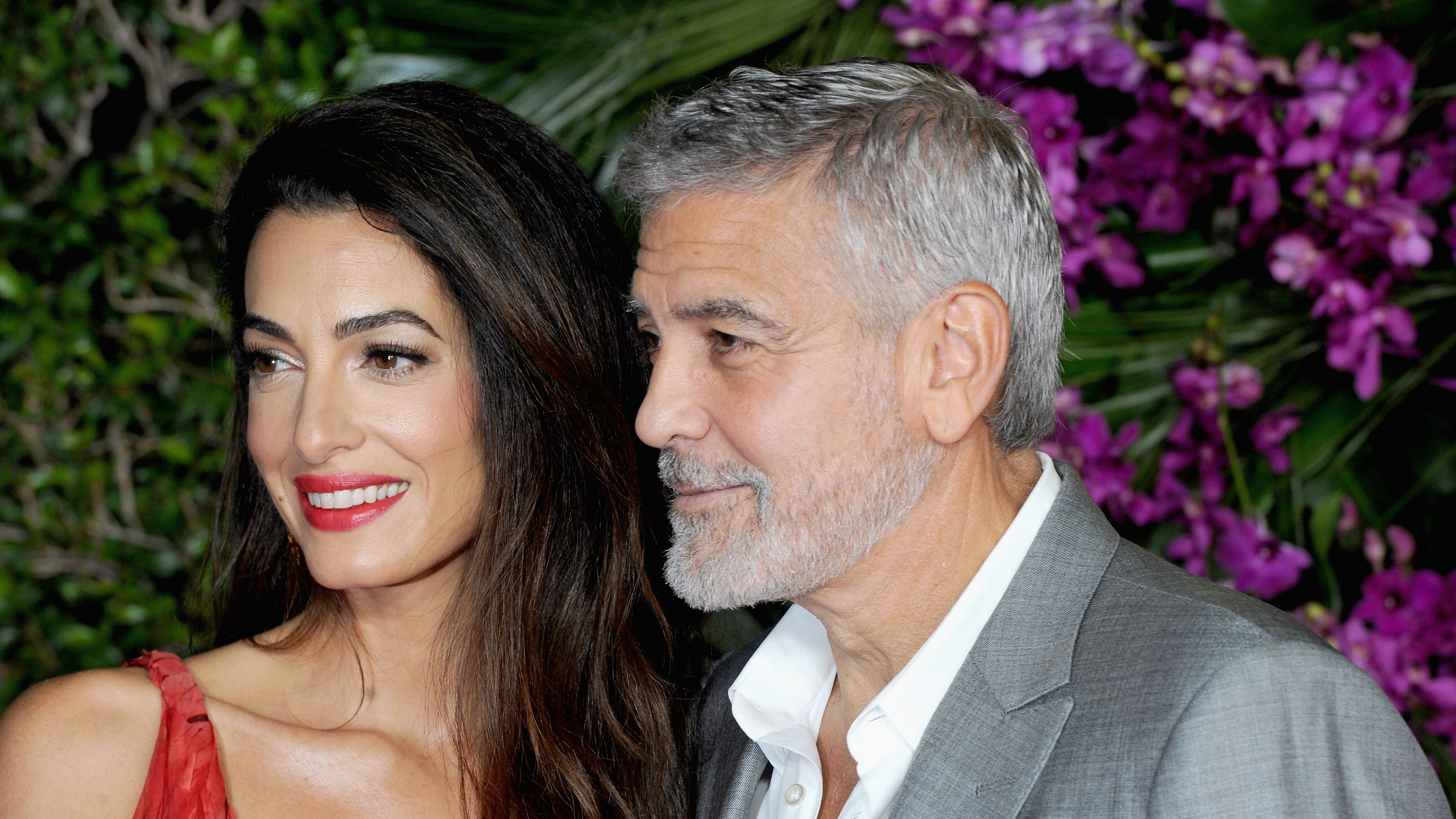 Amal Clooney Wears Red Alexander McQueen Gown at George's 'Ticket to  Paradise' Premiere