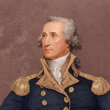 a man in a military uniform looks to the left