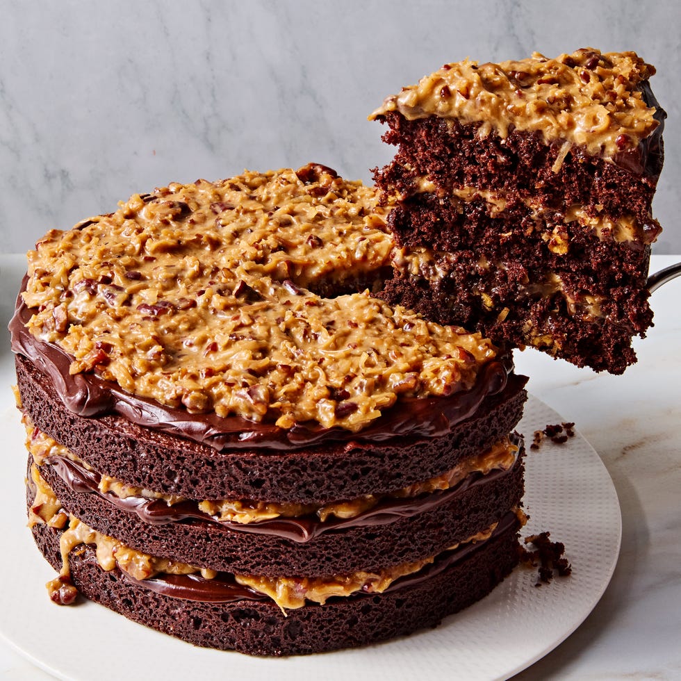layered chocolate cake with a coconut filling and topping