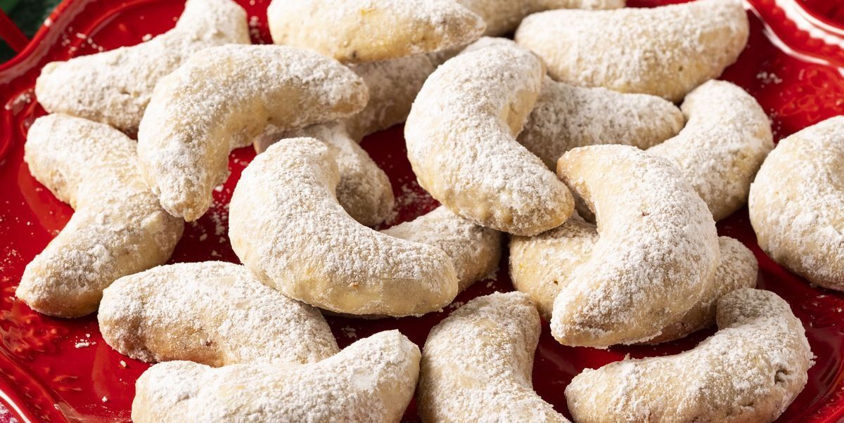 german christmas cookies crescent cookies on red plate