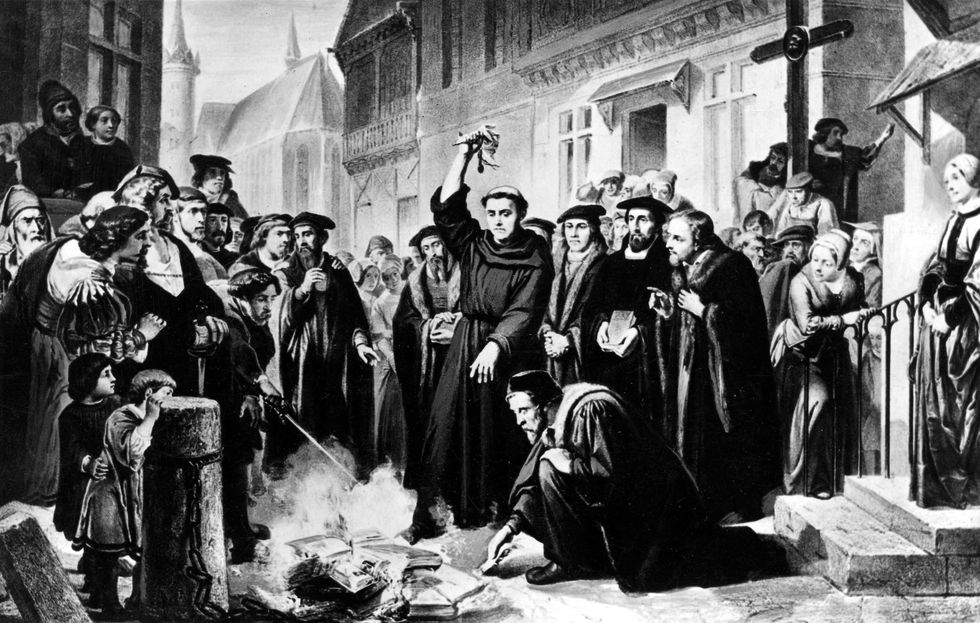 German Religious revolutionary and leader of the Protestant reformation Martin Luther burning the Papal Bull