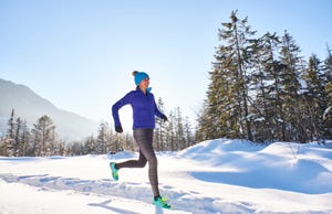 germany, bavaria, isar valley, vorderriss, woman jogging in winter