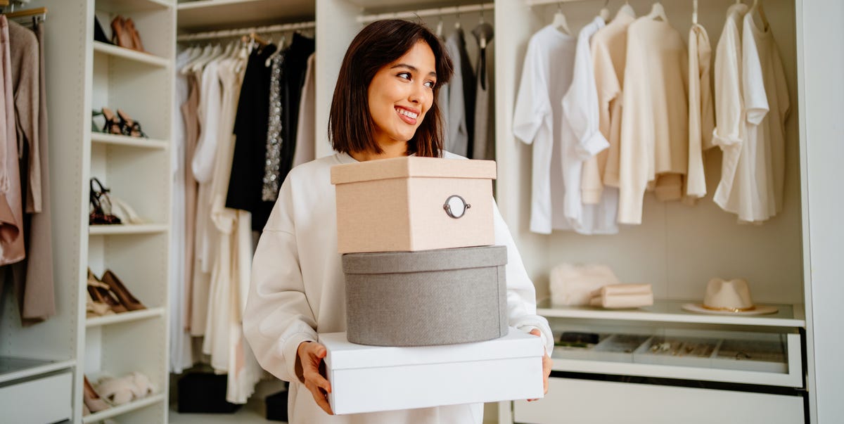 a woman decluttering her wardrobe