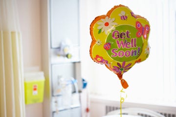 get well soon balloon bright colors flowers and butterflies