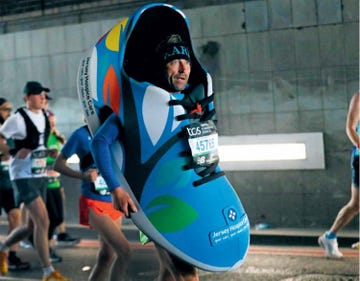 costumed runner in a large shoe outfit participating in a race