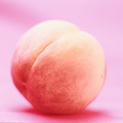 peach on pink background