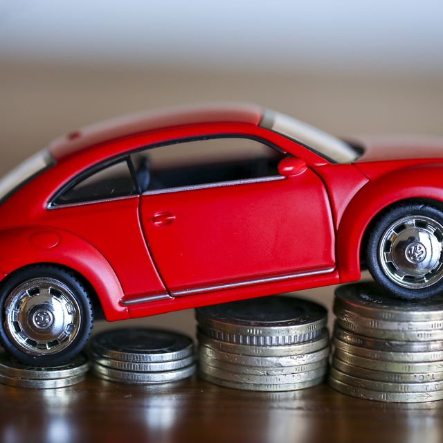 Volkswagen Beetle on coin stacks