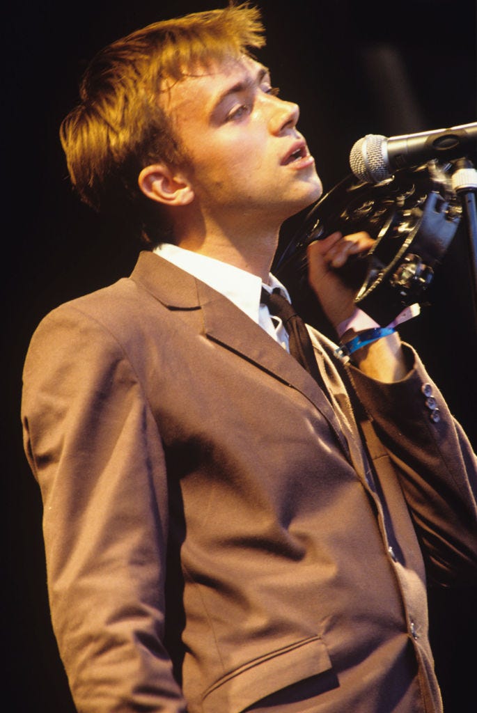 united kingdom june 28 singer damon albarn of blur performs on stage at the glastonbury festival on june 28, 1992 photo by mick hutsonredferns