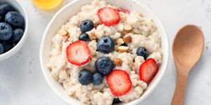 oatmeal porridge with fresh berries in a bowl top view concept of healthy eating, healthy lifestyle