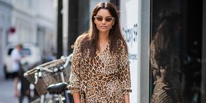 copenhagen, denmark august 07 funda christophersen wearing dress with leopard print, clut gaia bag seen outside blanche during the copenhagen fashion week springsummer 2019 on august 7, 2018 in copenhagen, denmark photo by christian vieriggetty images