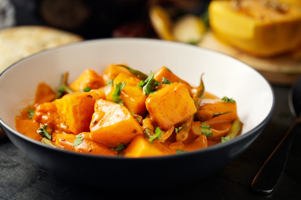 home made freshness butternut squash and green beans tikka with wild rice and naan bread