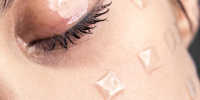 Close-Up Of Young Woman With Beauty Product