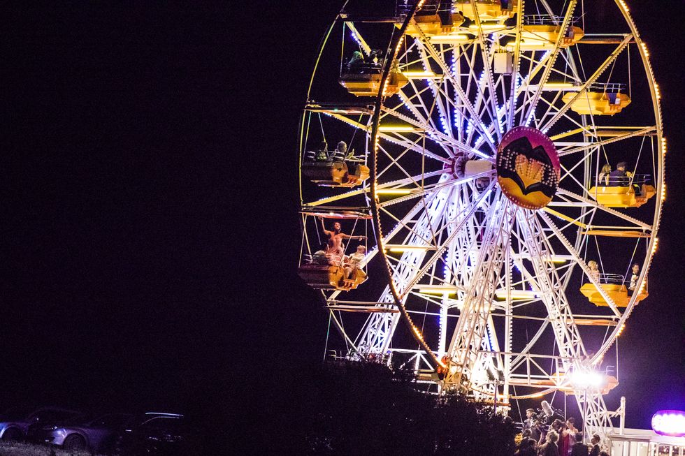Ferris wheel, Landmark, Tourist attraction, Amusement park, Wheel, Light, Night, Amusement ride, Recreation, Fun, 