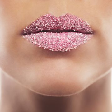 woman's lips covered in sugar