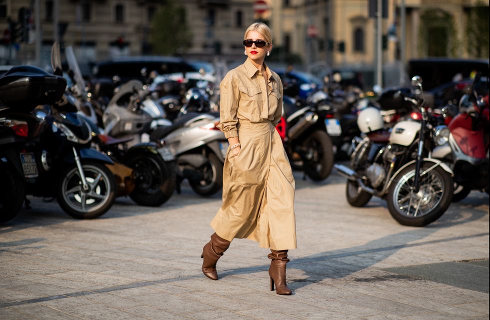 Street fashion, Fashion, Vehicle, Human, Street, Footwear, Outerwear, Coat, Scooter, Trench coat, 