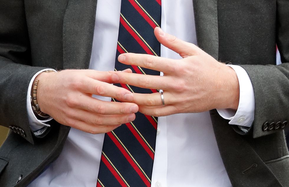 Tie, Finger, Hand, Suit, Formal wear, Nail, Gesture, Fashion accessory, Thumb, Flag, 