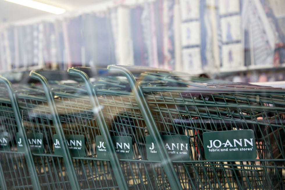 shopping carts sit in the front window of a jo ann store llc location in moline, illinois, us, on wednesday, sept 19, 2018 joann, the crafting and arts supplies chain which dropped fabrics from its name earlier this year, tried to make the case that many small businesses shop at its stores for supplies to make locally produced goods, leading it to dub trumps tariffs a made in america tax photographer daniel ackerbloomberg via getty images