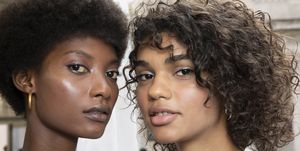 milan, italy   september 21  l r mame thiane camara and barbara valente  are seen backstage ahead of the blumarine show during milan fashion week springsummer 2019 on september 21, 2018 in milan, italy  photo by rosdiana ciaravologetty images