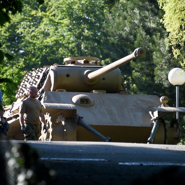 a panther battle tank is ready for transport on a residential property in heikendorf, germany, 02 july 2015 since 01 july, police and armed forces are removing recently discovered military equipment from world war ii including the panther tank, weapons and a torpedo the armoured recovery vehicle is used for safe transportation of weapons photo carsten rehderdpa  usage worldwide   photo by carsten rehderpicture alliance via getty images