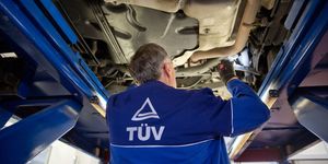 a staff member of tuv, the technical inspection association for cars and consumer products, insepects a car at the tuv testing and service station in berlin, germany, 4 november 2014 photo joerg carstensendpa  usage worldwide   photo by jörg carstensenpicture alliance via getty images
