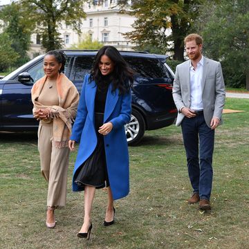 london, england   september 20 meghan, duchess of sussex c arrives with her mother doria ragland l and prince harry, duke of sussex to host an event to mark the launch of a cookbook with recipes from a group of women affected by the grenfell tower fire at kensington palace on september 20, 2018 in london, england photo by ben stansall   wpa poolgetty images