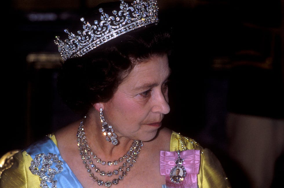 queen elizabeth ii, sweden, queen elizabeth ll attends the state banquet given in her honour by king carl xvl gustaf and queen silvia of sweden in stockholm, sweden, queen elizabeth wears the girls of great britain and ireland tiara, the greville chandelier earrings, the george vi festoon necklace and the true lovers knot brooch, queen silvia wears the massive braganza tiara, 25th may 1983. (photo by john shelley collection/avalon/getty images)