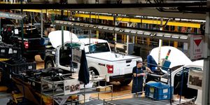 an employee works on the assembly line for the ford 2018 and 2019 f 150 truck at the ford motor companys rouge complex on september 27, 2018 in dearborn, michigan   ford motor companys rouge complex is the only one in american history to manufacture vehicles  including ships, tractors and cars  non stop for 100 years photo by jeff kowalsky  afp        photo credit should read jeff kowalskyafp via getty images