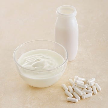 probiotic pills and yoghurt, still life probiotic pills and yoghurt, still life