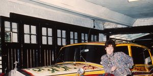 united kingdom   january 01  the british composer and member of the group the beatles posing in his houses garage in liverpool with his son julian lennon in front of his psychedelic rolls royce  photo by keystone francegamma keystone via getty images