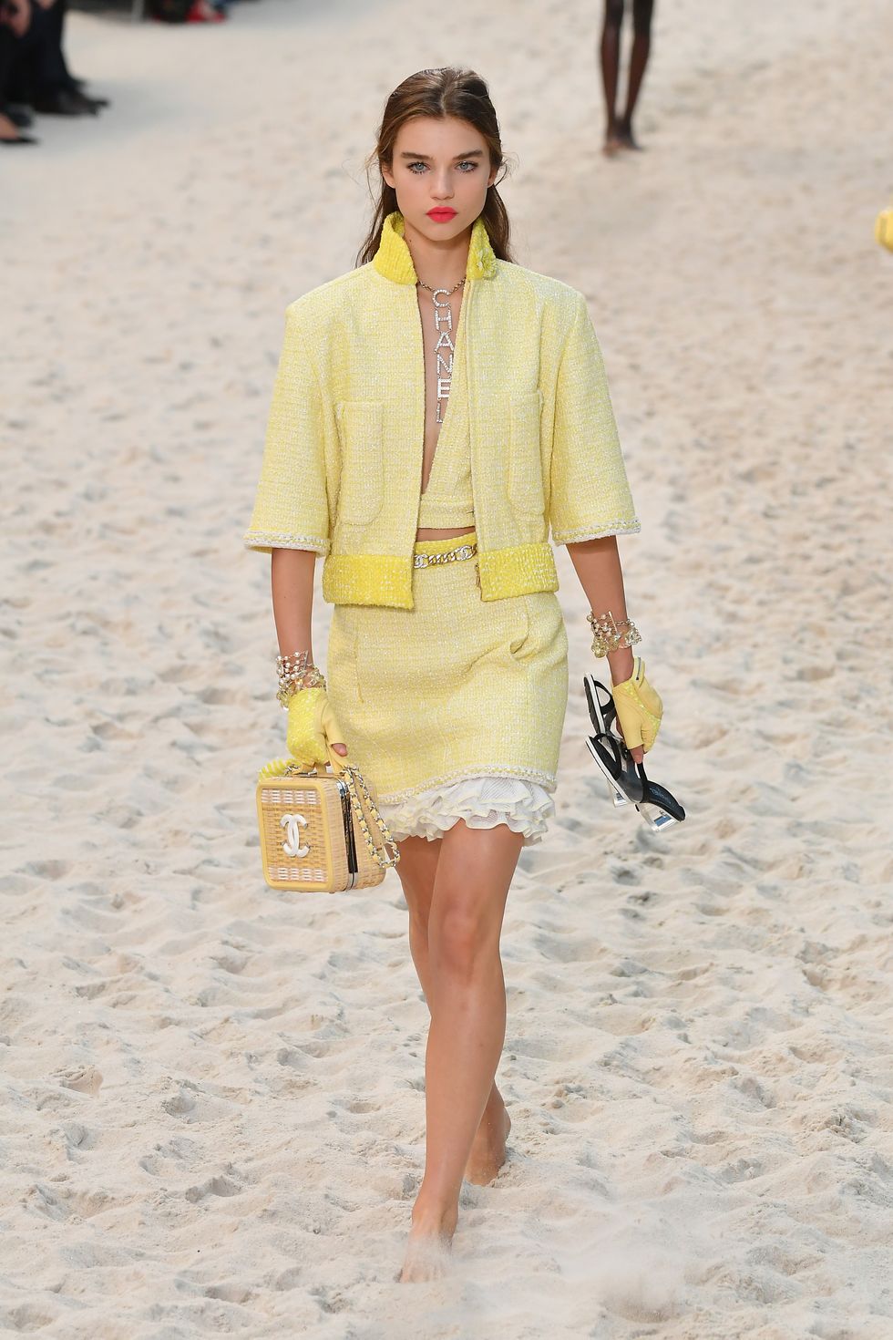 Chanel's Spring 2019 Runway Was a Beach With an Ocean and Lifeguard On Duty