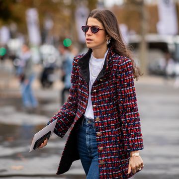 paris, france   october 02 leandra medine wearing blazer jacket, denim jeans is seen outside chanel during paris fashion week womenswear springsummer 2019 on october 2, 2018 in paris, france photo by christian vieriggetty images