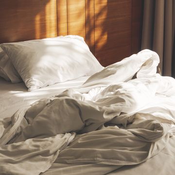 bed mattress pillows duvet unmade bedroom morning with sunlight bedroom home interior