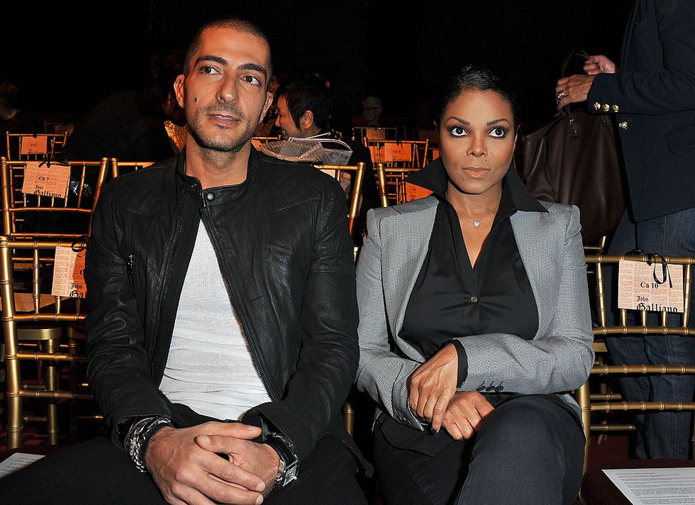 paris   october 03  wissam al mana and janet jackson attend the john galliano ready to wear springsummer 2011 show during paris fashion week at opera comique on october 3, 2010 in paris, france  photo by pascal le segretainwireimage
