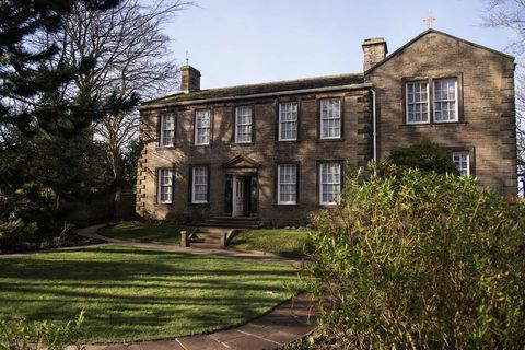 an exterior view of the bronte parsonage museum, the former home of the bronte family and the place where their novels were written, in haworth, northern england on february 16, 2018   this year marks the bicentenary of the birth of emily bronte, the author of wuthering heights, and also the 90th anniversary of the opening of the bronte parsonage museum the museum houses the worlds largest collection of bronte manuscripts, furniture and personal possessions, and welcomed over 85,000 visitors photo by oli scarff  afp        photo credit should read oli scarffafp via getty images