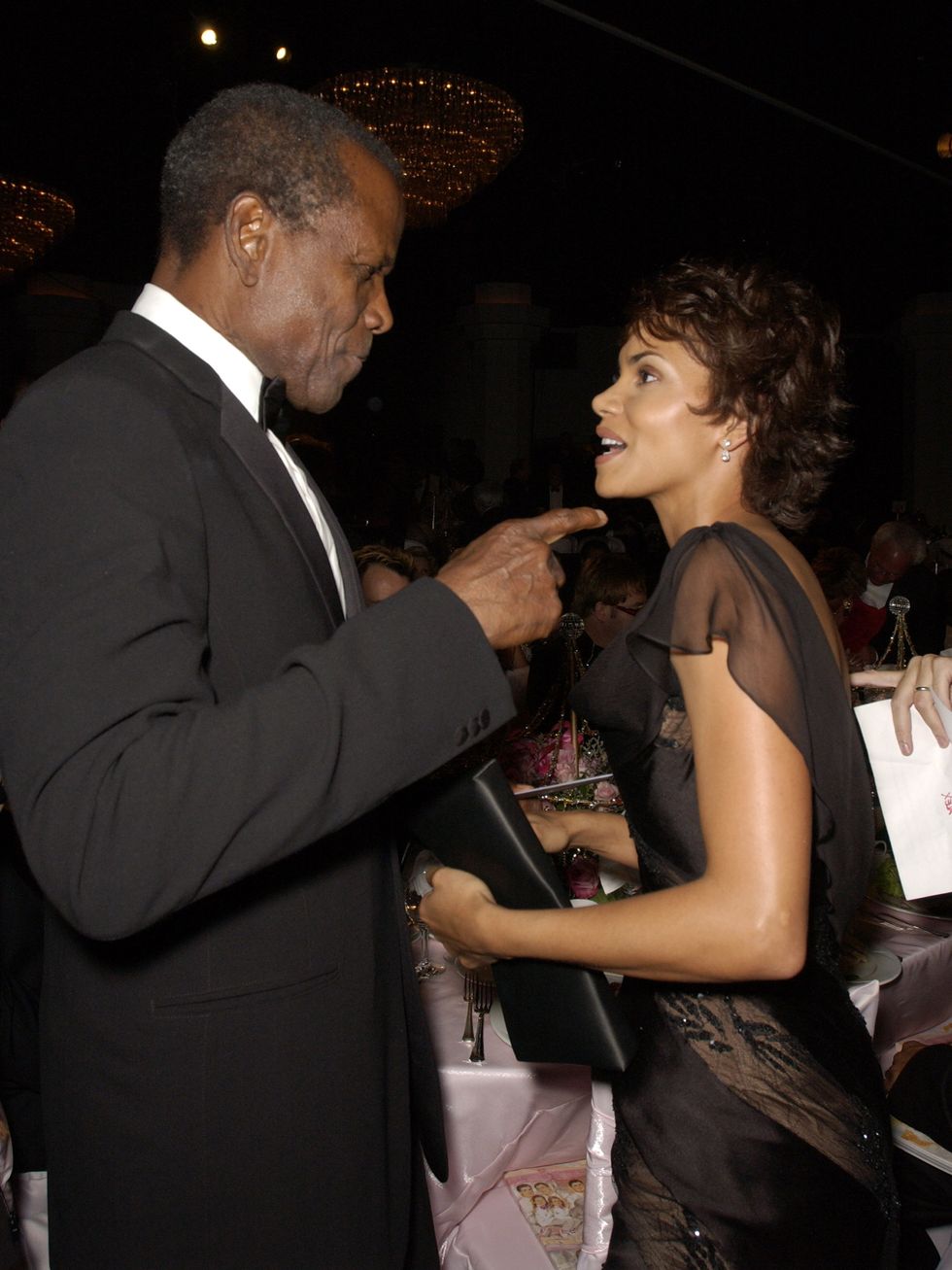 sidney poitier and halle berry during the 15th carousel of hope ball   show and audience at beverly hilton hotel in beverly hills, california, united states photo by m caulfieldwireimage