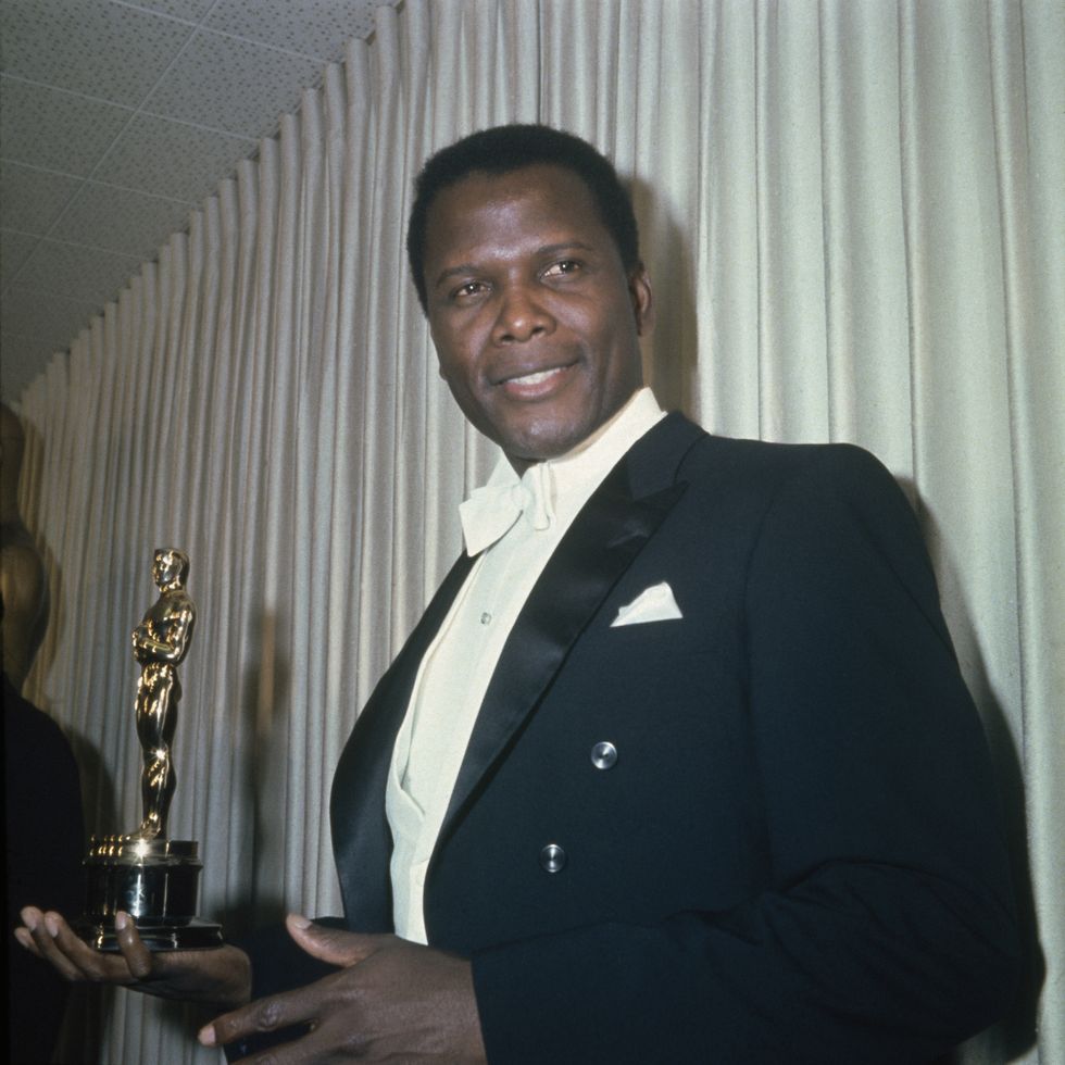 bahamian american actor sidney poitier holding his academy award for best actor in a leading role for 'lilies of the field', directed by ralph nelson, at the 36th academy awards ceremony, 13th april 1964 the ceremony was held at the santa monica civic auditorium, santa monica, california photo by archive photosgetty images
