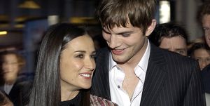 ashton kutcher and demi moore during charlies angels 2 full throttle premiere red carpet at manns chinese theatre in hollywood, california, united states photo by l cohenwireimage