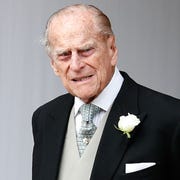 BRITAIN-ROYALS-WEDDING-EUGENIE britains prince philip, duke of edinburgh waits for the carriage carrying princess eugenie of york and her husband jack brooksbank to pass at the start of the procession after their wedding ceremony at st georges chapel, windsor castle, in windsor, on october 12, 2018 photo by alastair grant pool afp photo by alastair grantpoolafp via getty images