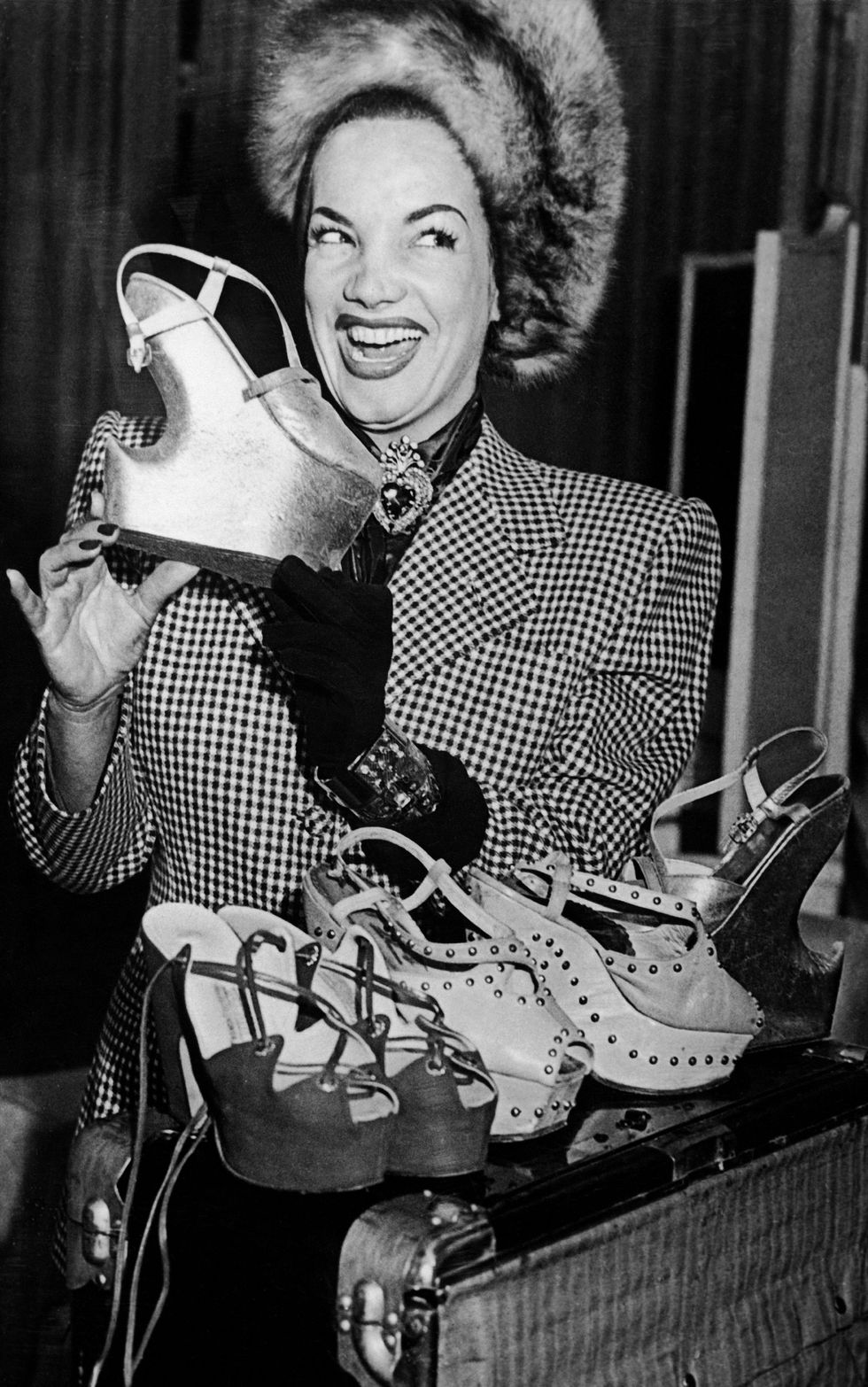 united kingdom   april 23  in london on april 23, 1948, the brazilian actress carmen miranda presents a pair of her platform shoes with a heel ranging from 8 to 12cm high, these shoes were then causing a stir in the fashion arena  photo by keystone francegamma keystone via getty images