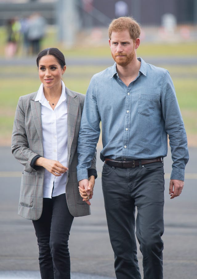 dubbo, australia october 17 meghan, duchess of sussex and prince harry, duke of sussex attend a naming and unveiling ceremony for the new royal flying doctor service aircraft at dubbo airport on october 17, 2018 in dubbo, australia the duke and duchess of sussex are on their official 16 day autumn tour visiting cities in australia, fiji, tonga and new zealand photo by dominic lipinski poolgetty images