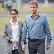 The Duke And Duchess Of Sussex Visit Australia - Day 2 dubbo, australia october 17 meghan, duchess of sussex and prince harry, duke of sussex attend a naming and unveiling ceremony for the new royal flying doctor service aircraft at dubbo airport on october 17, 2018 in dubbo, australia the duke and duchess of sussex are on their official 16 day autumn tour visiting cities in australia, fiji, tonga and new zealand photo by dominic lipinski poolgetty images