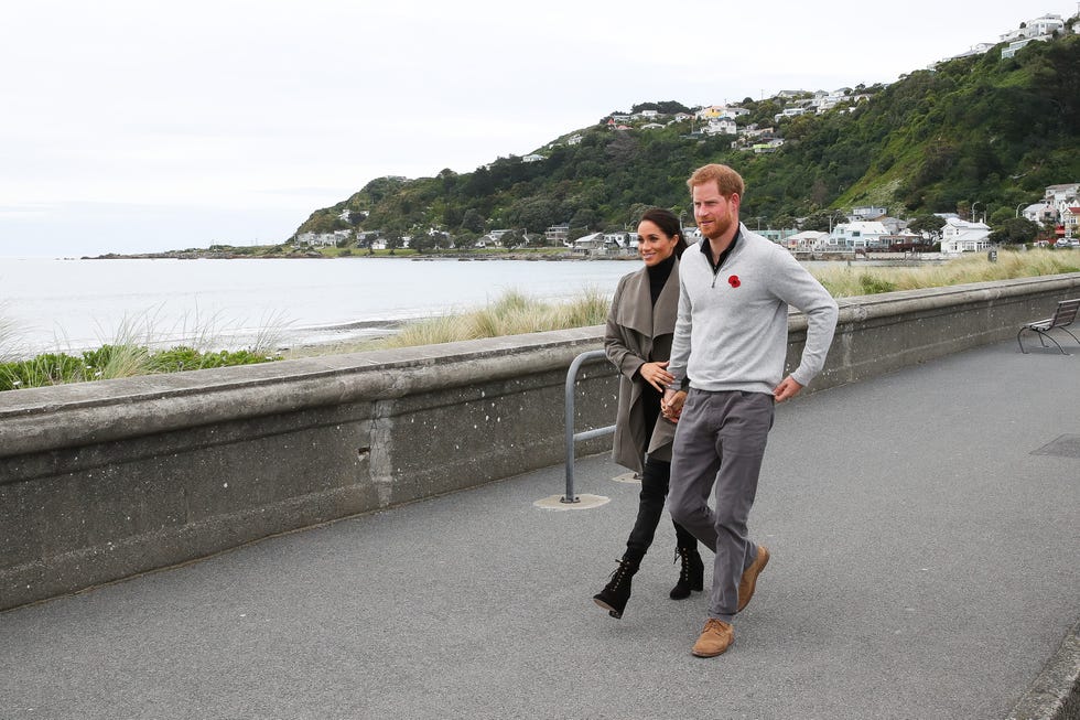 wellington, new zealand   october 29  prince harry, duke of sussex and meghan, duchess of sussex walking along lyall bay to visit maranui cafe on october 29, 2018 in wellington, new zealand the duke and duchess of sussex are on their official 16 day autumn tour visiting cities in australia, fiji, tonga and new zealand  photo by chris jacksongetty images