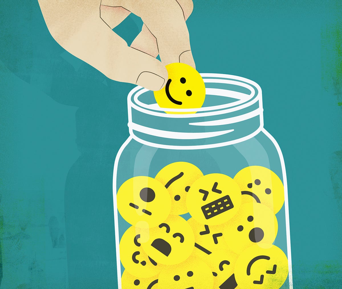 GettyImages-1055622554_C2101_R1803552.jpg Hand choosing smiley face from jar of emoticons