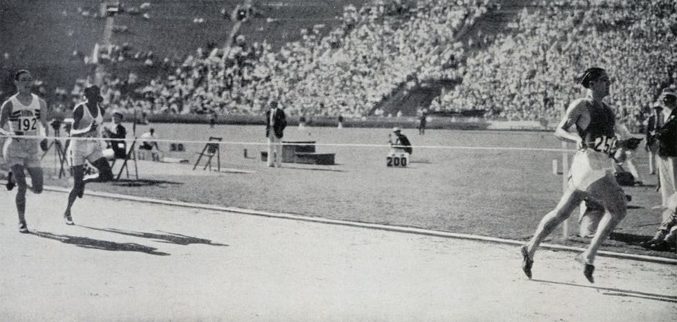 the victory of luigi beccali in the 1500 metres, behind him jerry cornes and phil edwards, 1932 olympics in los angeles, united states of america, 20th century