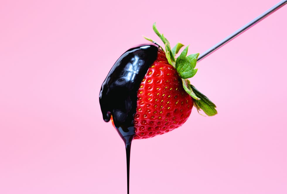 strawberry dripping chocolate syrup