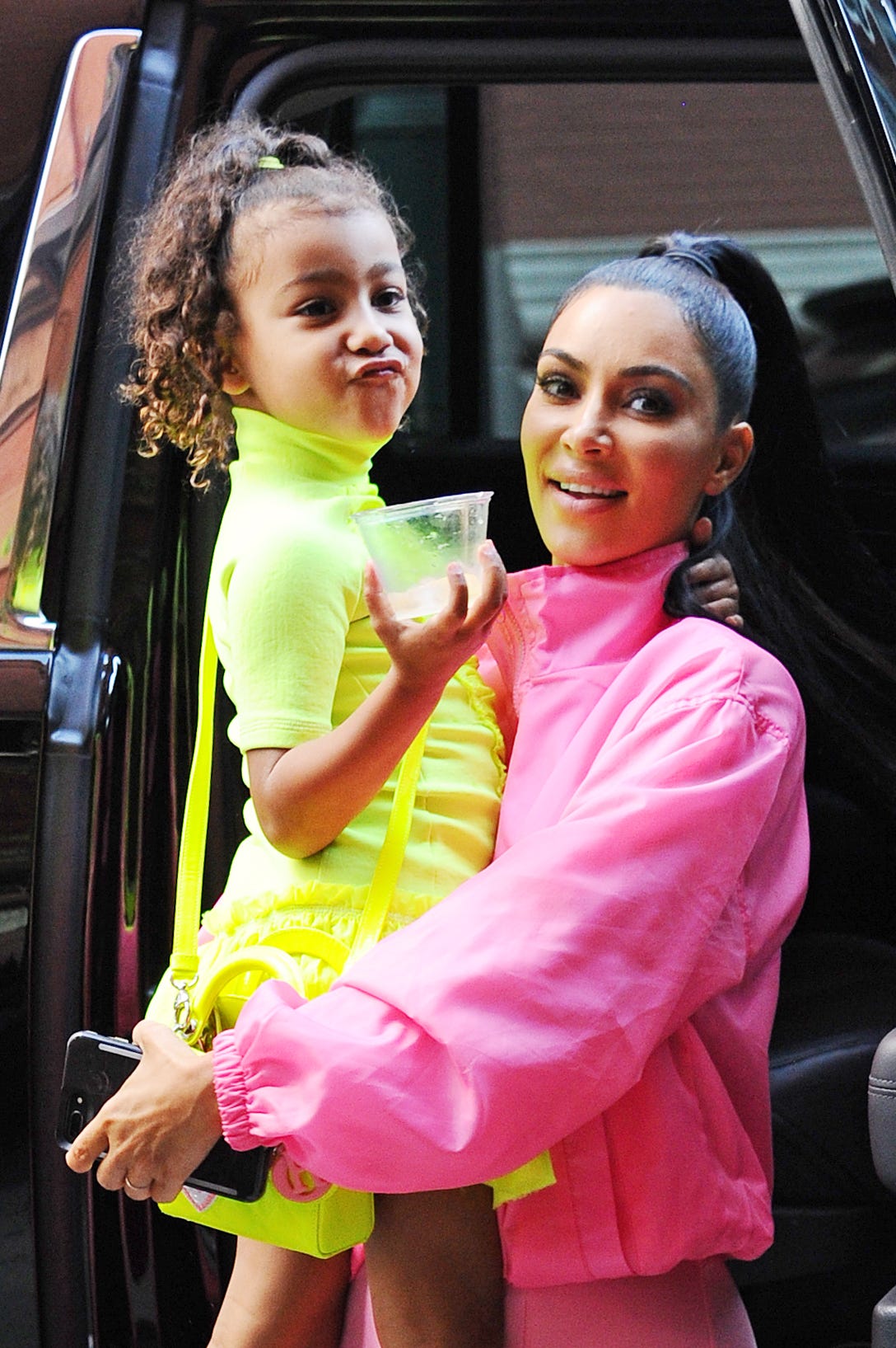 Kim Kardashian's four-year-old daughter North West steps out with