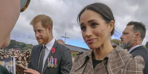 wellington, new zealand   october 28, 2018 the duke and duchess of sussex chat with members of the crowd at the wellington war memorial in new zealand
