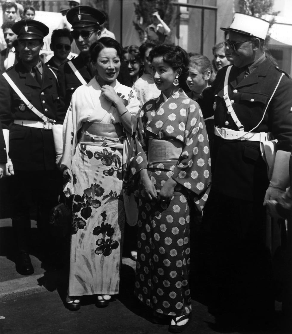 in their colourful traditional kimonos, the two japanese actresses kaoru yachigusa left and michiko tanara walk along the promenade of cannes photograph taken in 1955 photo georg göbel dpa  usage worldwide photo by georg göbelpicture alliance via getty images