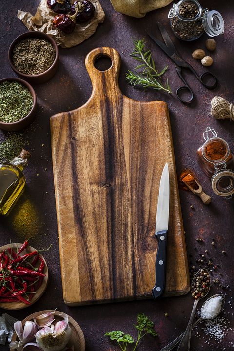 Old wooden cutting board shot from above