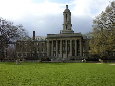 wide view of old main at the pennsylvania state university   this is the iconic administrative center for the university and its original building that was built in 1885  quite a stately image of my alma mater